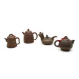 A collection of four Chinese Yixing zisha teapots,