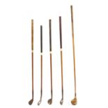 A mixed set of hickory shafted vintage golf clubs,