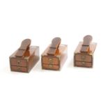 Three 'Starbay Portland' rosewood finish shoe shine boxes,