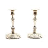 A pair of Elizabeth II silver candlesticks,