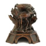 A French Black Forest-style carved wooden mantel vase,