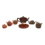 A collection of 5 Chinese Yixing zisha teapot,