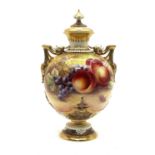 A Royal Worcester porcelain two handled vase and cover,