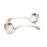 A pair of George III Old English pattern and thread silver sauce ladles,
