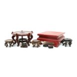 A collection of Chinese wood stands,