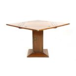 A 'Starbay De Grasse' rosewood finish and star inlaid lunch table,