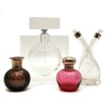 A modern clear glass scent bottle and stopper,