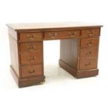 A George III style mahogany pedestal desk,
