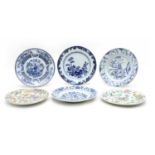 A collection of 21 Chinese blue and white plates and 4 famille rose dishes,