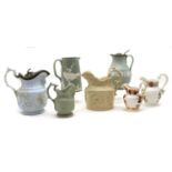 A collection of seven Victorian pottery jugs,