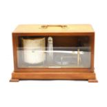 An early 20th century oak cased barograph,