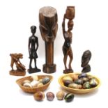 A collection of various tribal figures of varying heights,