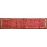 A Persian wool runner,