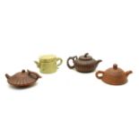 A collection of four Chinese Yixing zisha teapots,