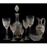 A large suite of cut glass drinking glasses,