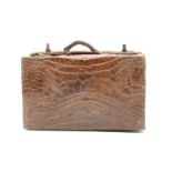 A crocodile skin/cayman case,