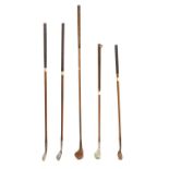 A mixed set of hickory shafted vintage golf clubs,