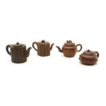 A collection of four Chinese Yixing zisha teapots,