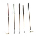 A collection of hickory shafted vintage golf clubs,