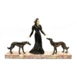 An Art Deco design bronzed group of a woman with two hounds,