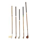 A mixed set of hickory shafted vintage golf clubs,