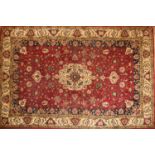 A Persian style rug,