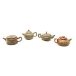 A collection of four Yixing zisha teapots,