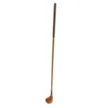 A Tom Morris vintage golf driver,