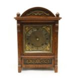An early 20th century oak cased bracket clock,