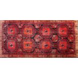 A Persian Bokhara rug,