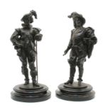 A pair of Continental Spelter figures of Musketeers,