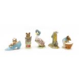 Eleven Beswick Beatrix Potter figures,