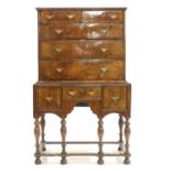 A walnut chest on stand,