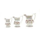 A graduated set of three Victorian pottery jugs