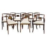 A harlequin set of eleven George III mahogany dining chairs,