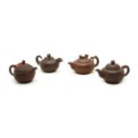 A collection of four Yixing zisha teapots,