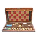 A Victorian mahogany games compendium,