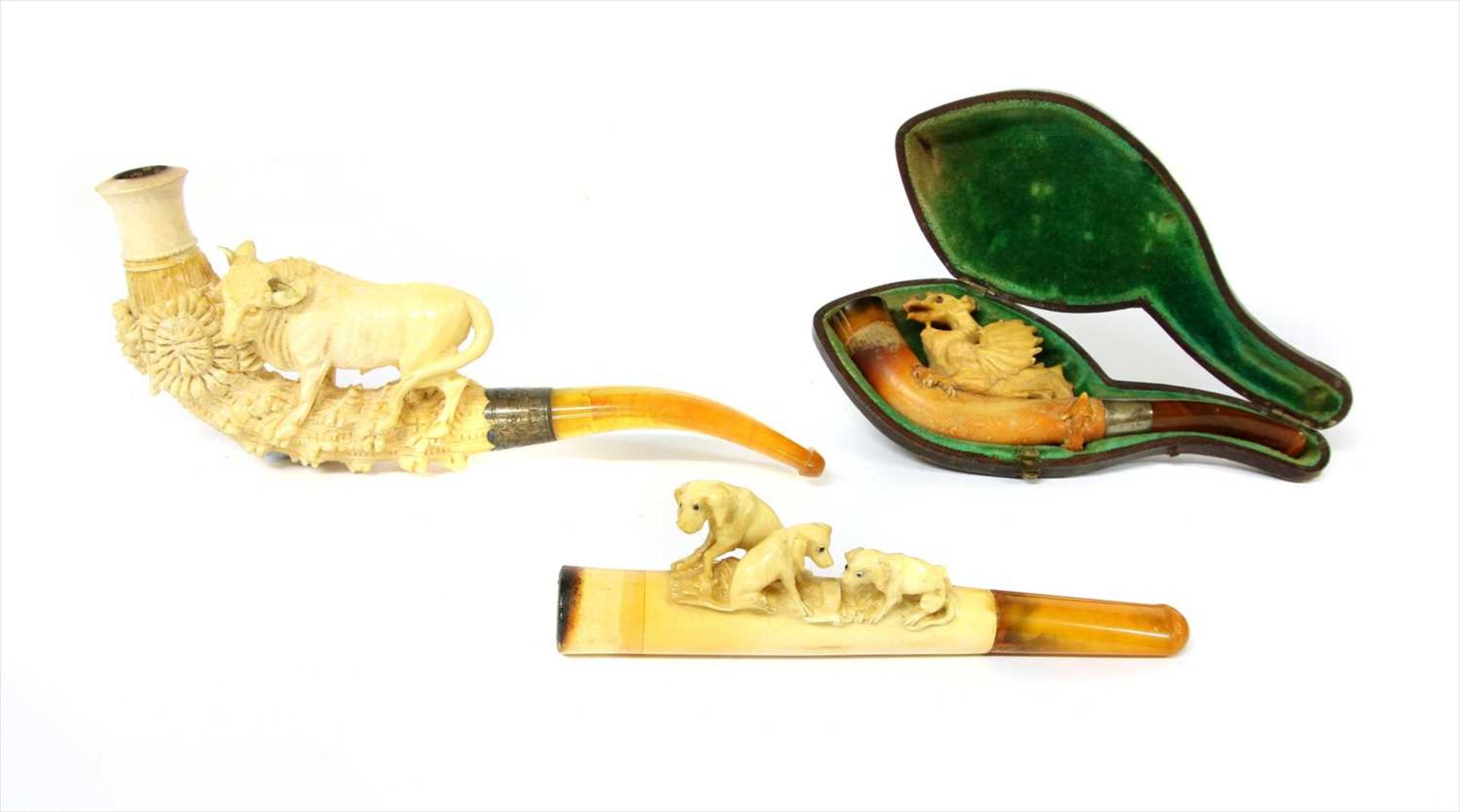 Three meerschaum cheroot holders or pipes,