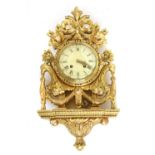 A Swedish gilt framed wall clock,