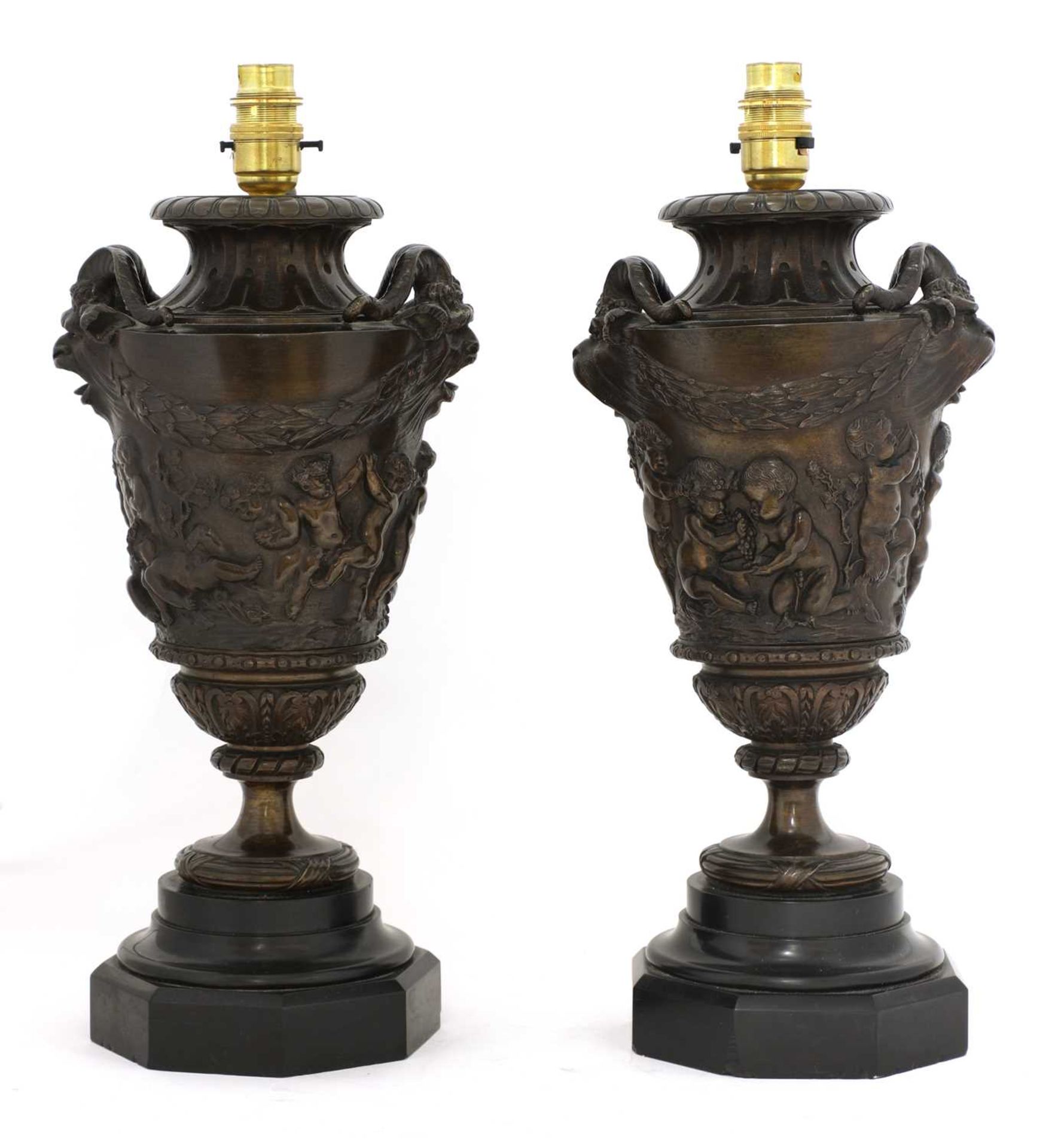 A pair of bronze table lamps,