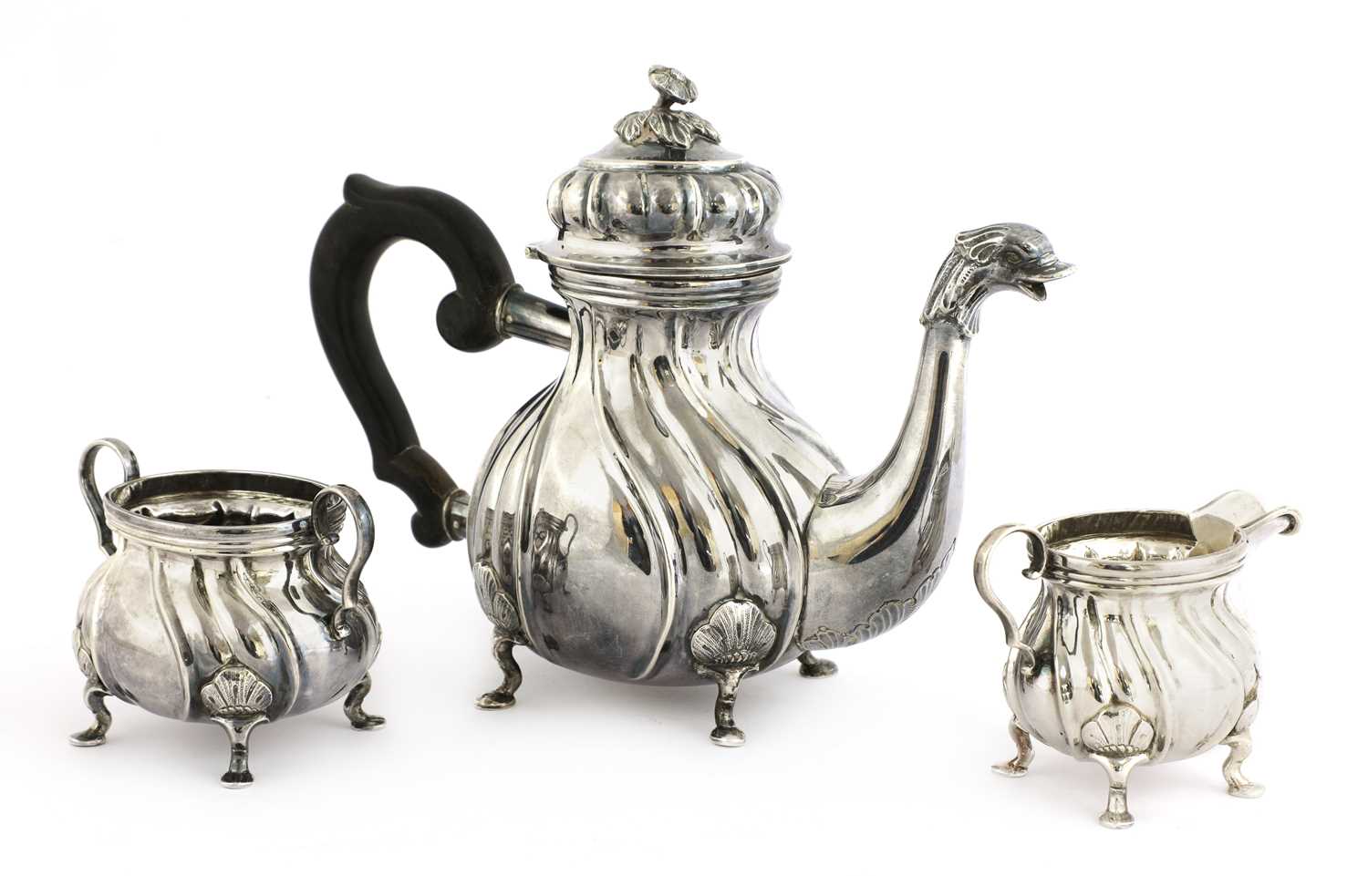 A Continental .830 standard three-piece tea set,