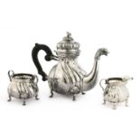 A Continental .830 standard three-piece tea set,