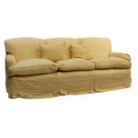 A pair of three seater sofas,