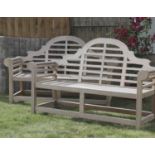 A pair of teak Lutyens garden seats