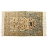 A Turkish silk Hereke rug,
