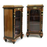 A pair of late Victorian walnut cabinets,