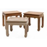 A pair of modern hardwood low tables,