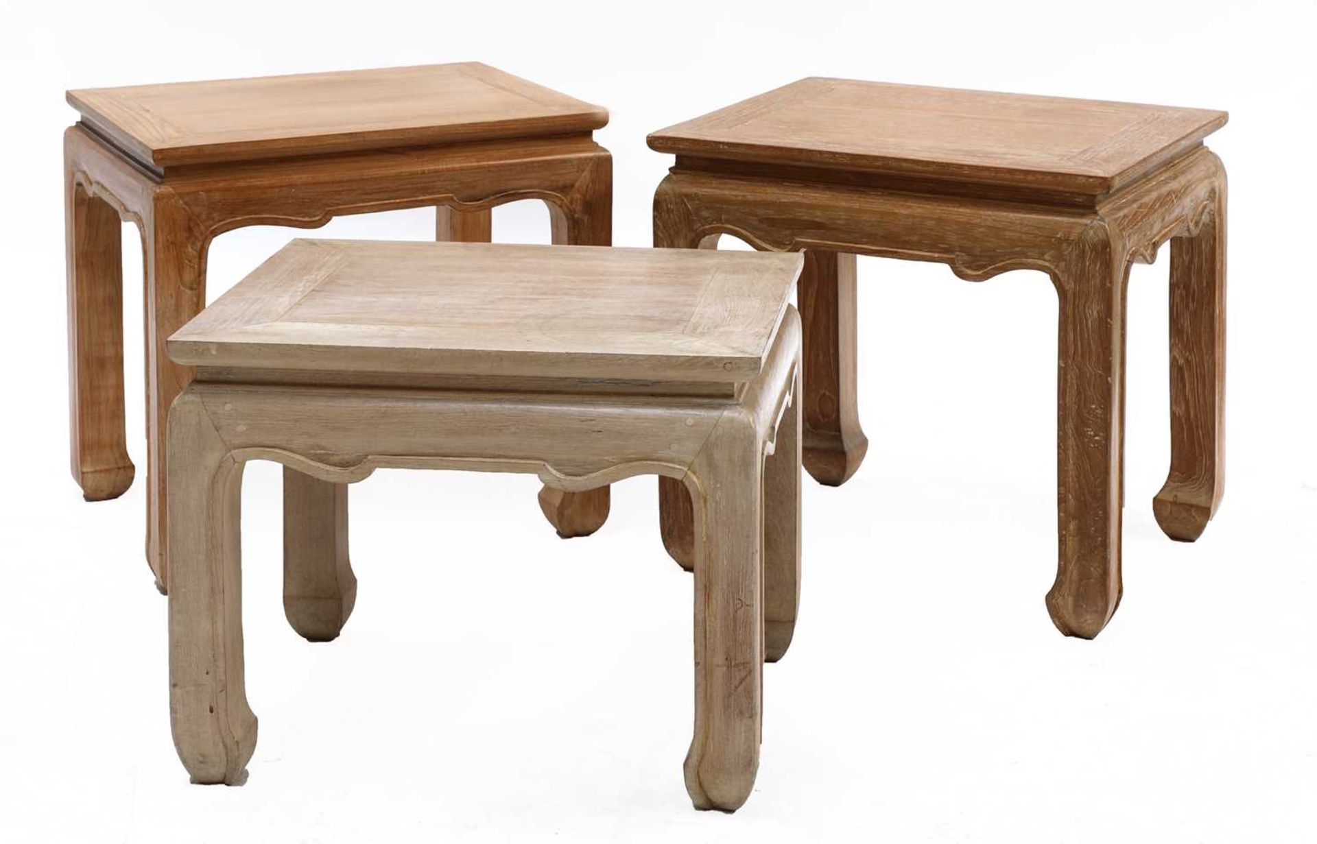A pair of modern hardwood low tables,