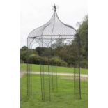 A Regency design wrought iron wirework arbour,