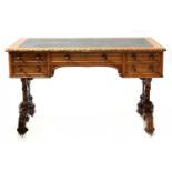 A Victorian Gothic oak library table,